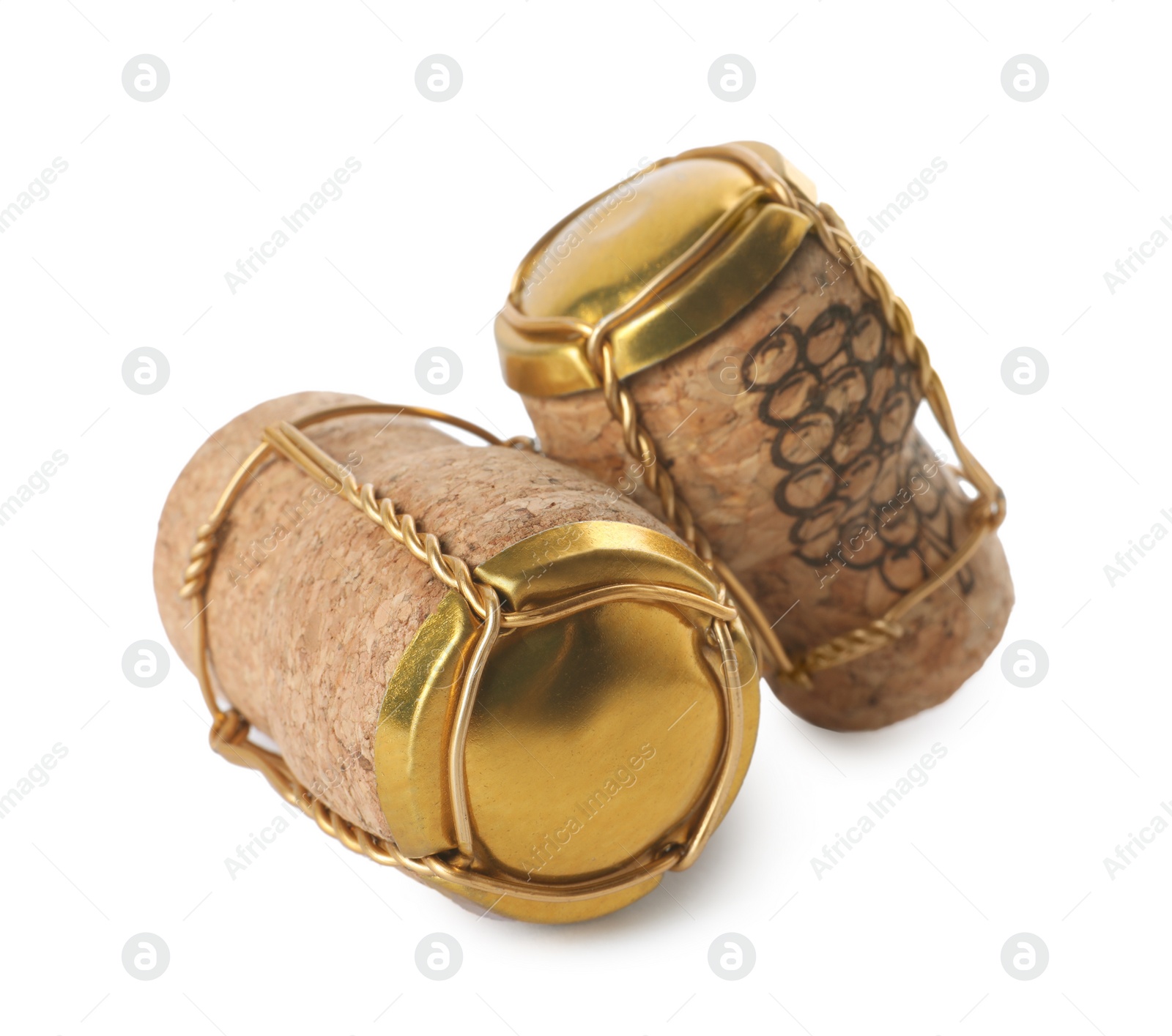 Photo of Corks of sparkling wine and muselet caps on white background