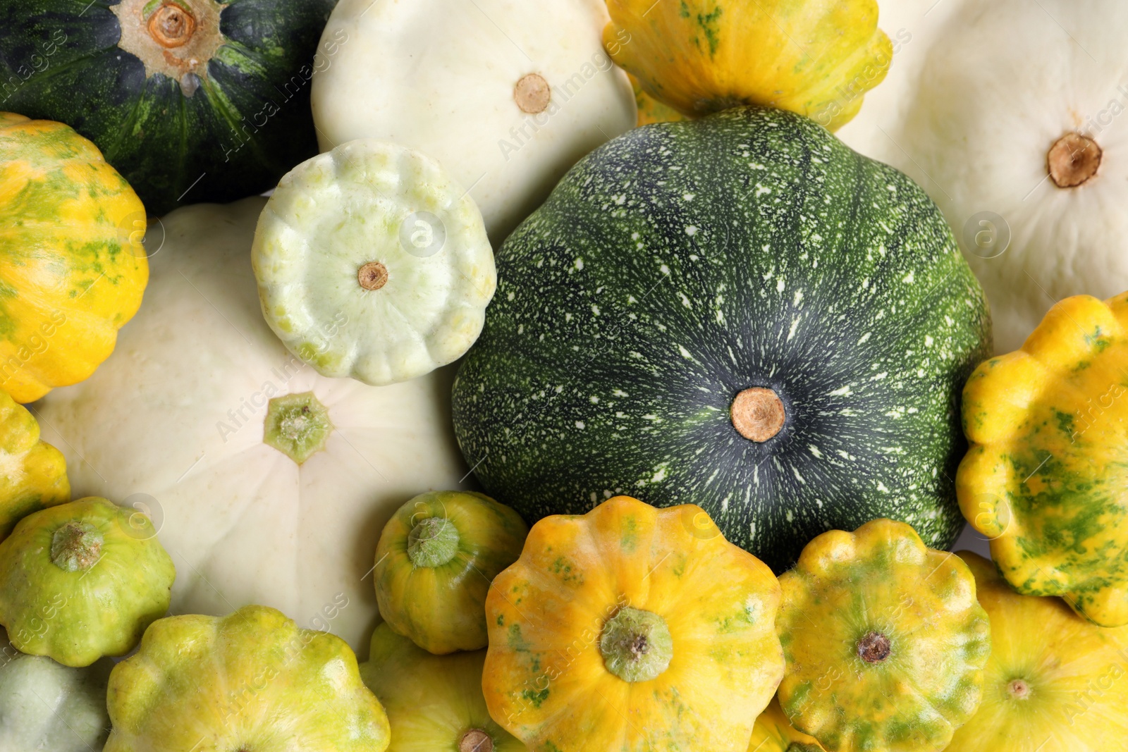 Photo of Fresh ripe pattypan squashes as background, top view