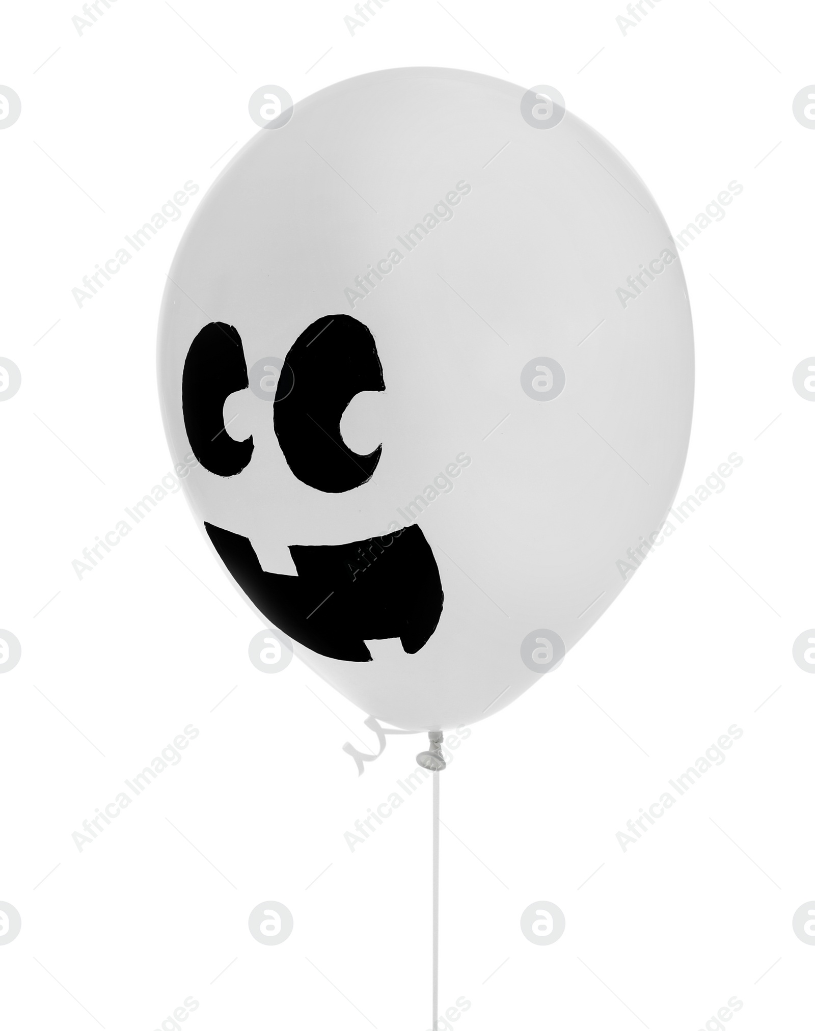 Photo of Balloon with drawing of happy face on white background. Halloween party