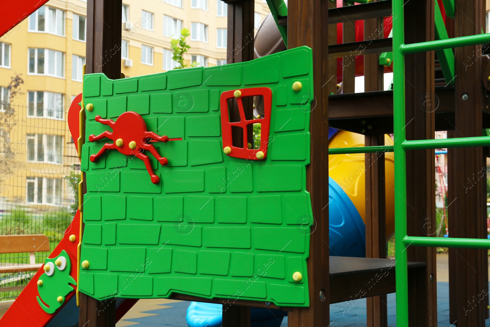 Photo of Colourful outdoor playground for children in residential area