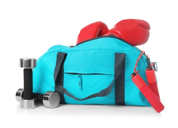 Sports bag and gym stuff on white background