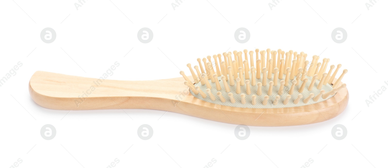 Photo of New wooden hair brush isolated on white