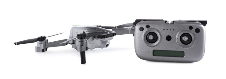 Photo of Modern drone with controller isolated on white