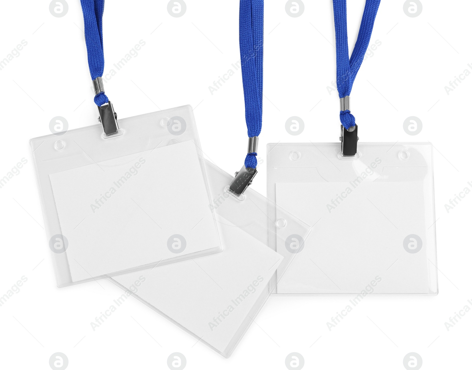 Photo of Blank badges on white background. Mockup for design
