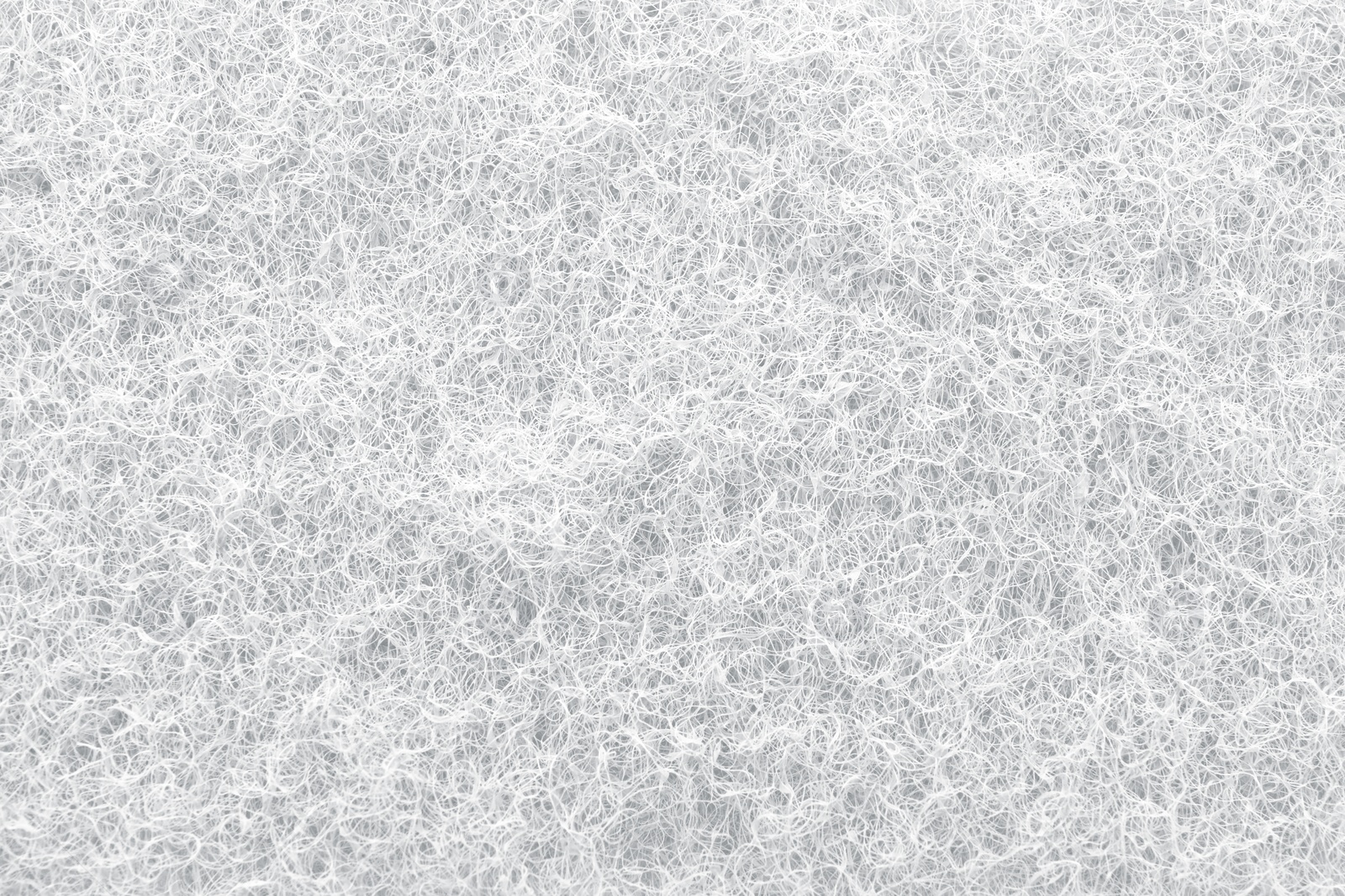 Image of White abrasive cleaning sponge as background, closeup