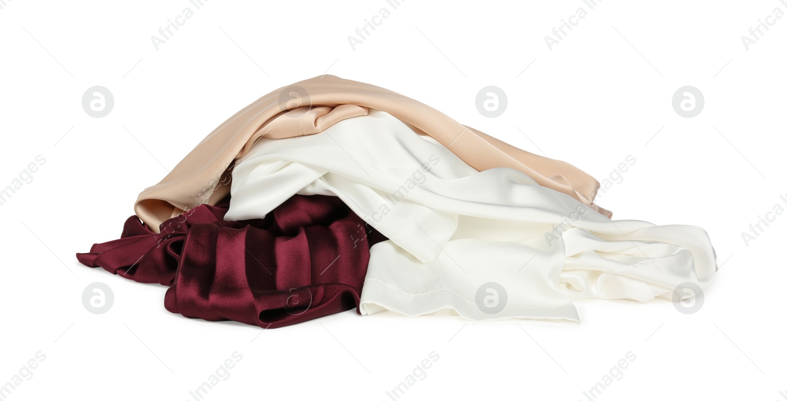 Photo of Pile of colorful clothes isolated on white