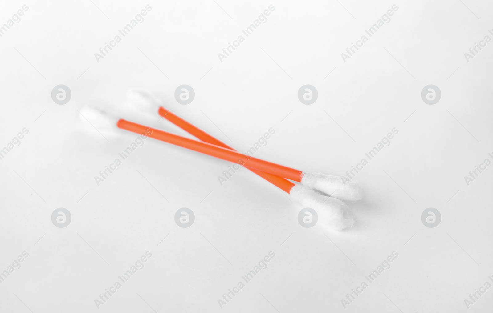 Photo of Clean cotton buds on white background. Hygienic accessory