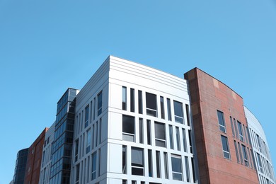 View of modern building against blue sky