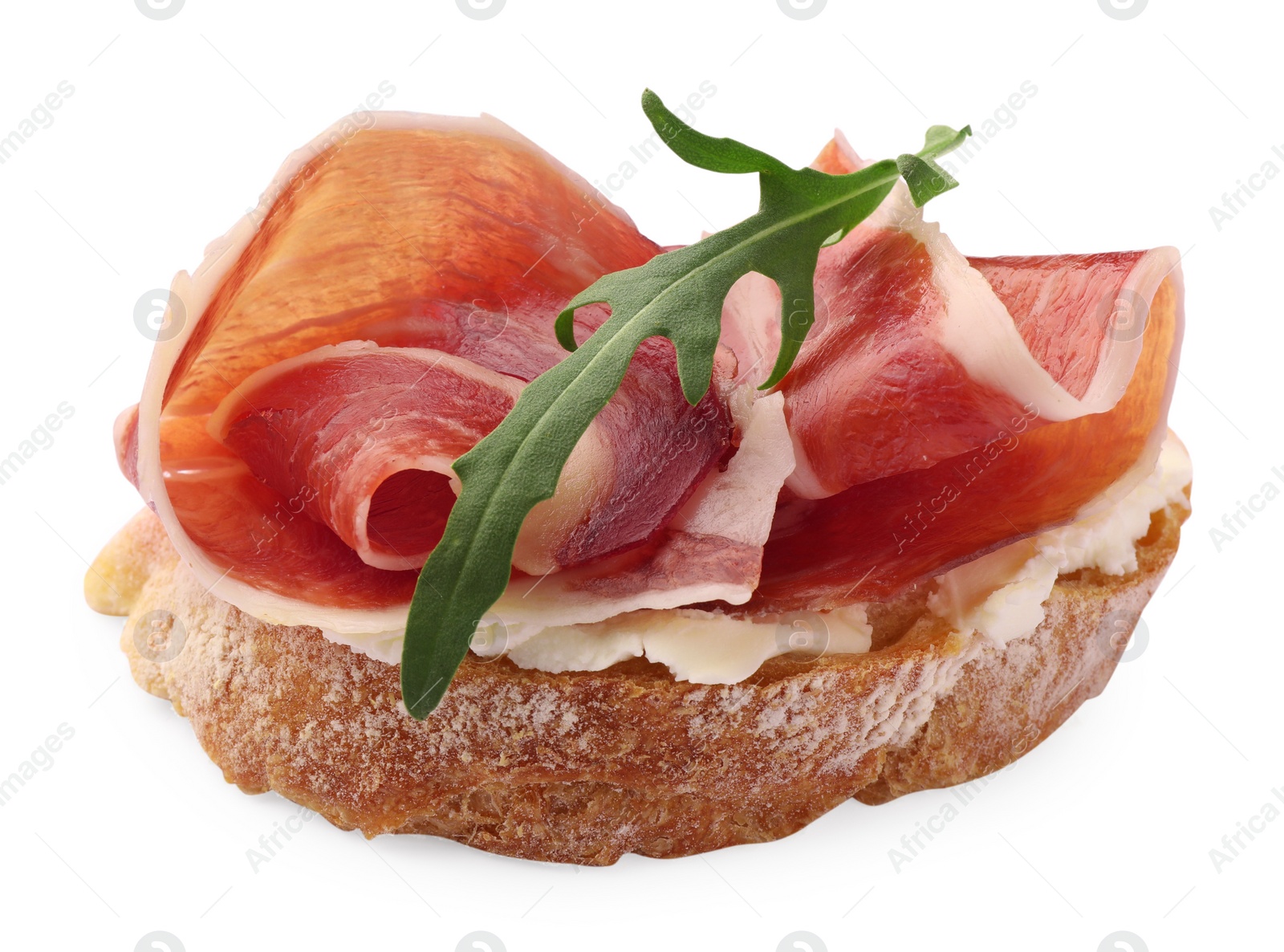 Photo of Tasty sandwich with cured ham and arugula isolated on white