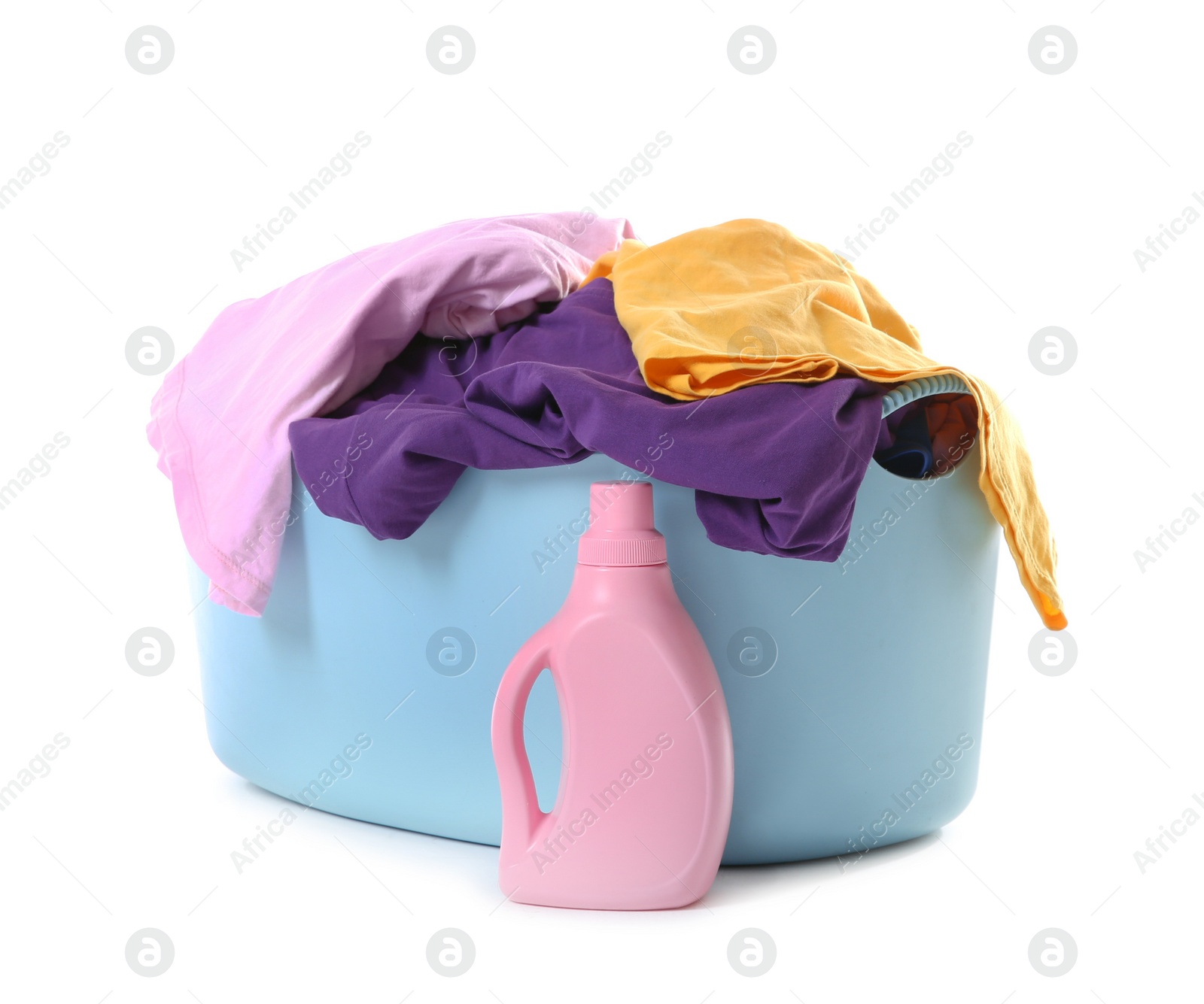 Photo of Laundry basket with dirty clothes and detergent isolated on white