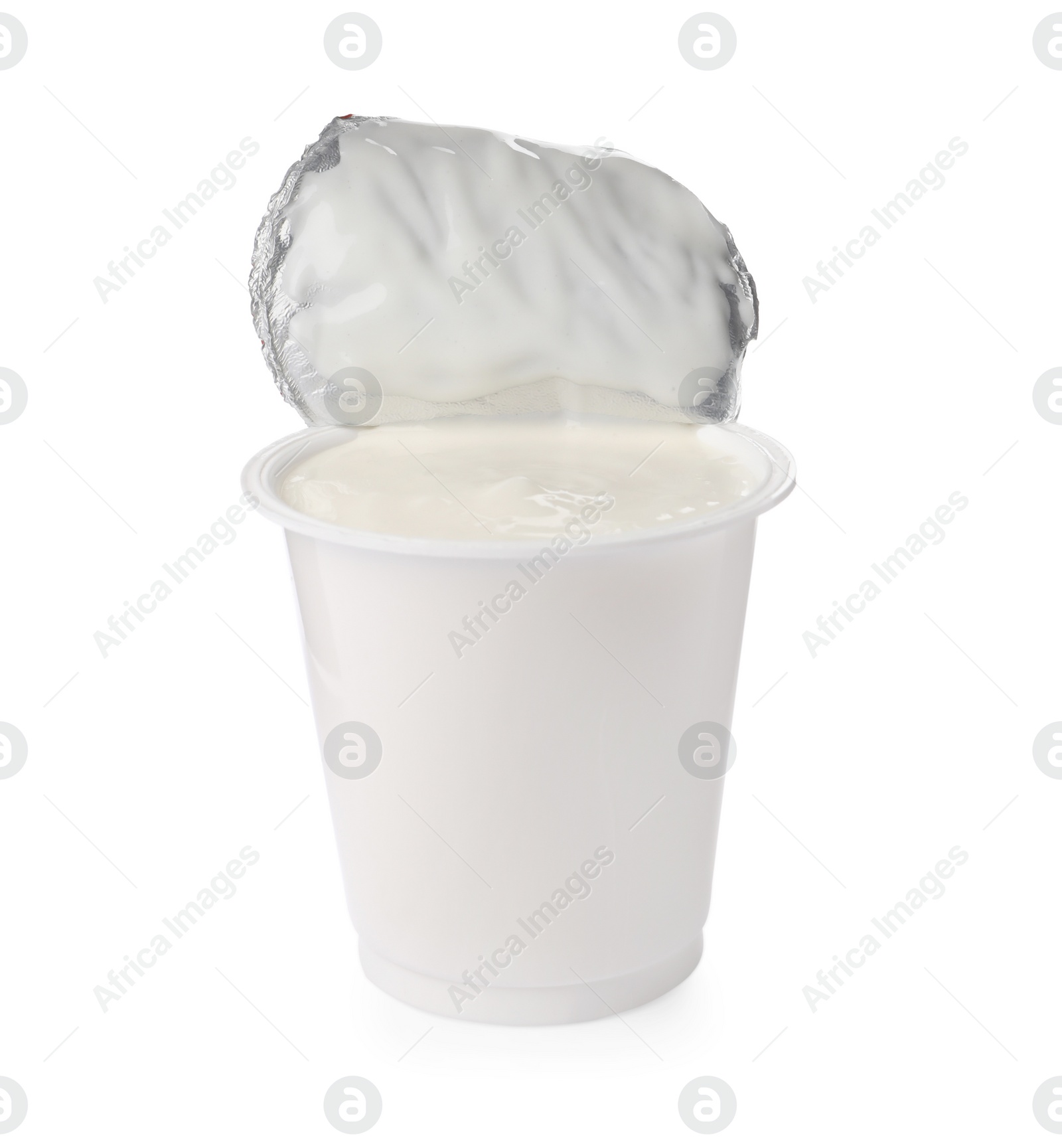 Photo of Delicious organic yogurt in plastic cup isolated on white