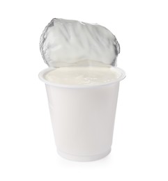 Photo of Delicious organic yogurt in plastic cup isolated on white