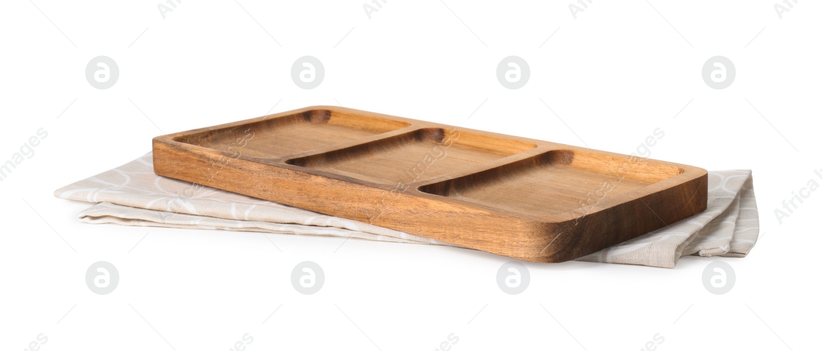 Photo of Wooden serving board and kitchen towel on white background