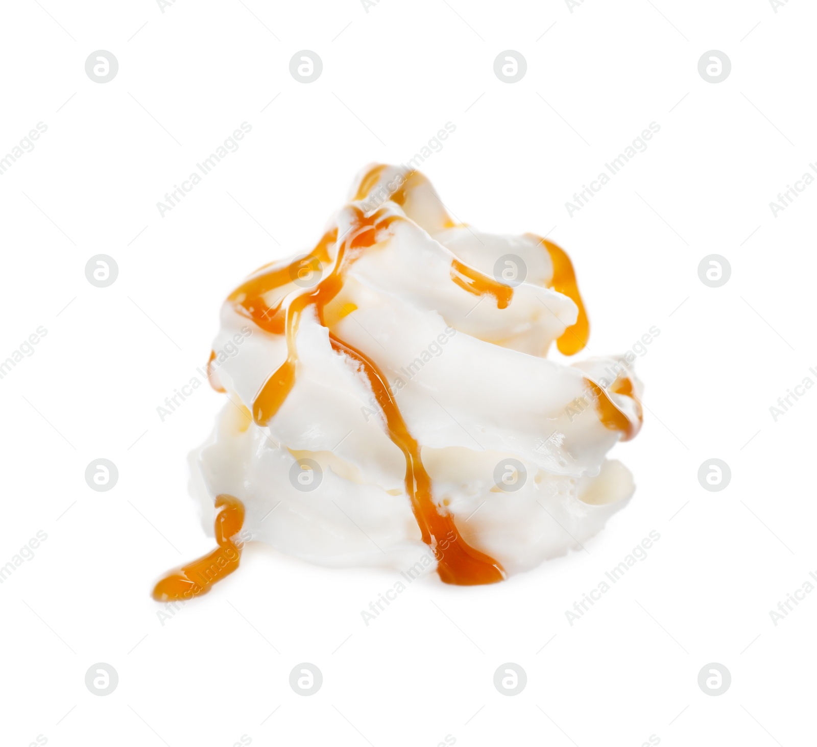 Photo of Whipped cream swirl with caramel sauce isolated on white background