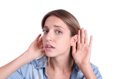 Photo of Young woman with hearing problem on white background