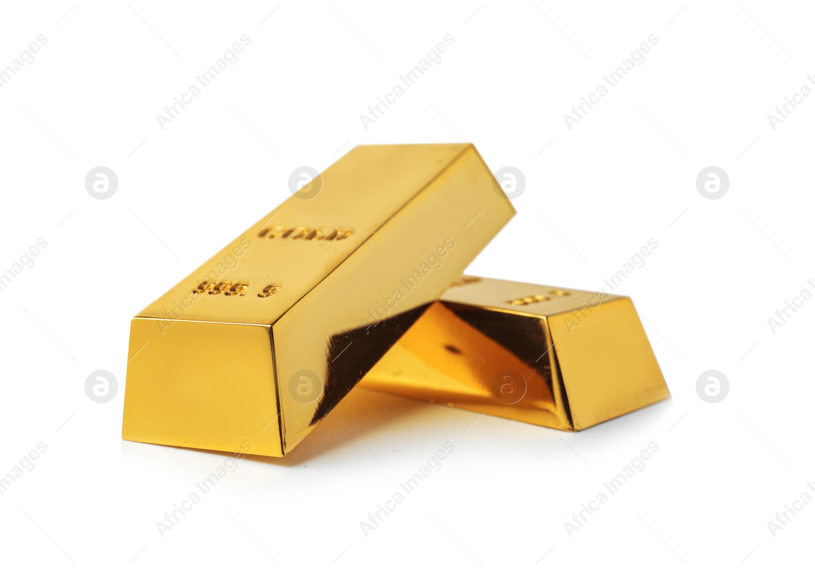 Photo of Precious shiny gold bars on white background