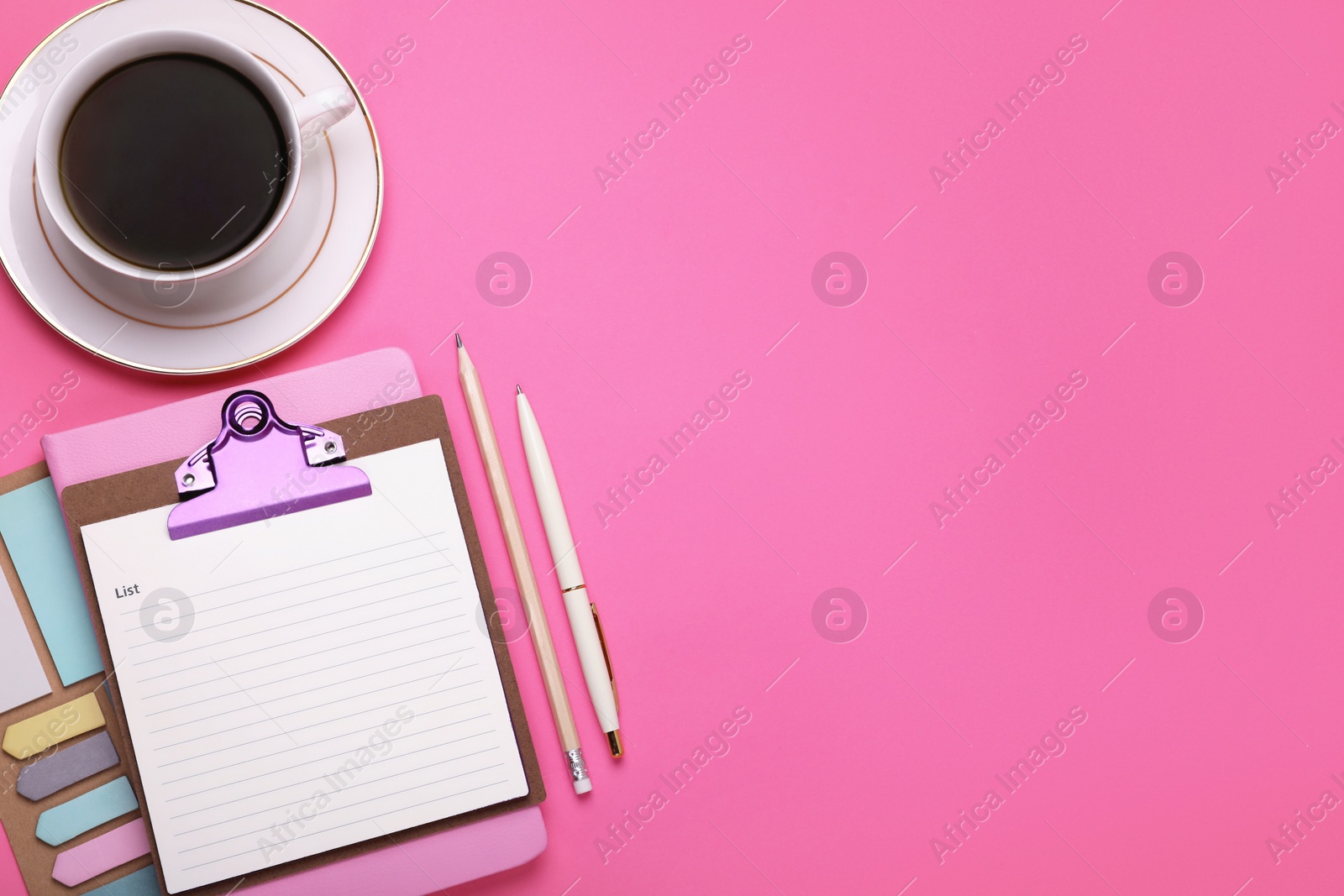 Photo of To do notes, stationery, planner and cup of coffee on pink background, flat lay. Space for text