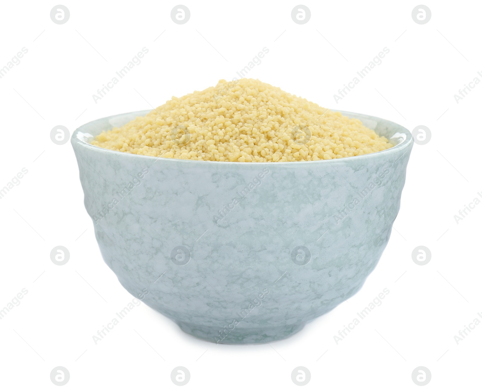 Photo of Bowl of raw couscous isolated on white