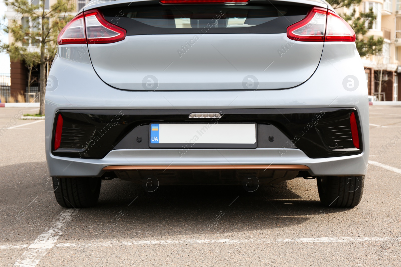 Photo of Car with vehicle registration plate outdoors, closeup