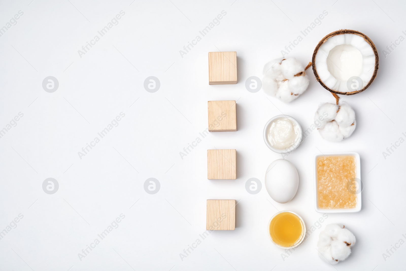 Photo of Cubes with word "Acne" and homemade problem skin remedy ingredients on white background