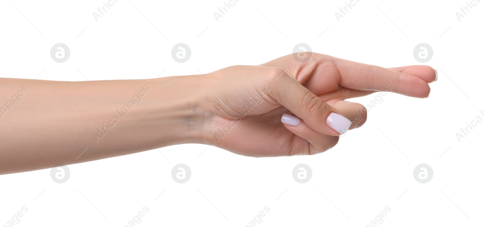 Photo of Woman crossing her fingers on white background, closeup