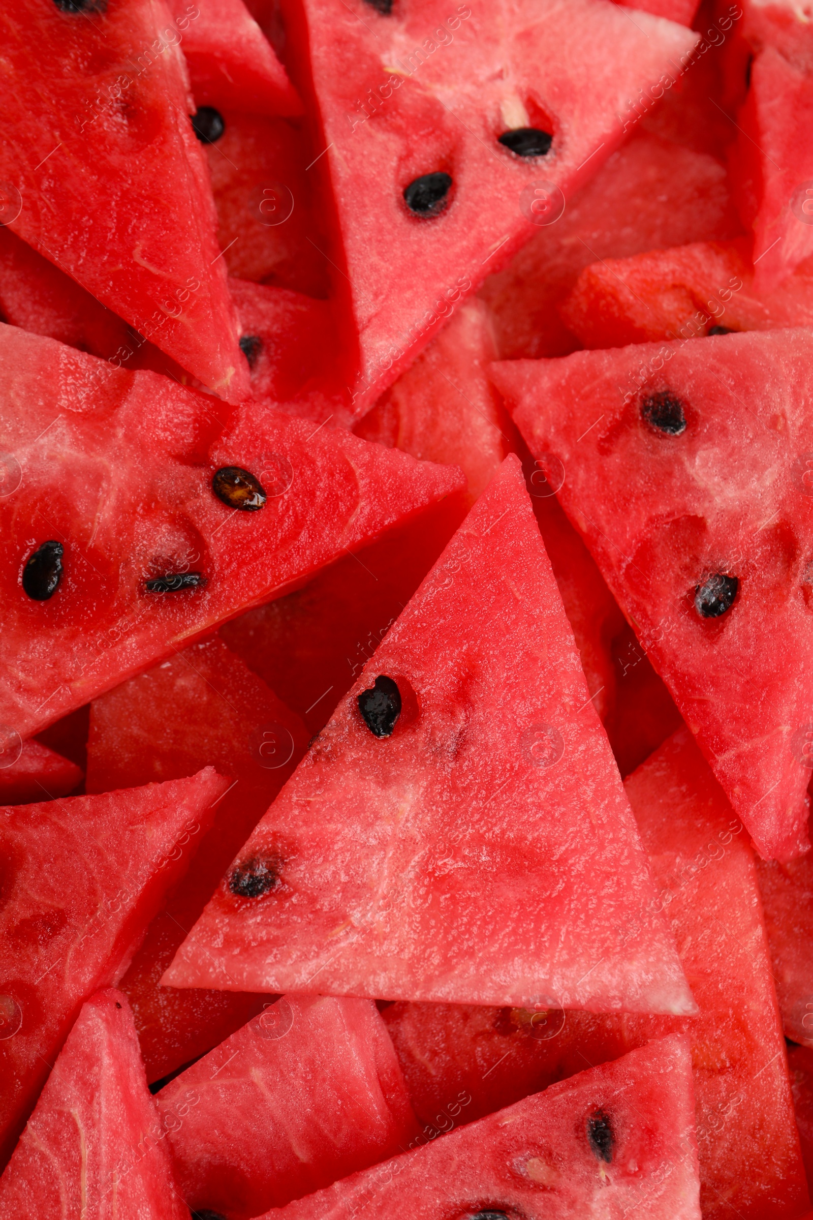 Photo of Delicious fresh watermelon slices as background, closeup