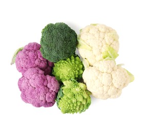 Different fresh cabbages on white background, top view