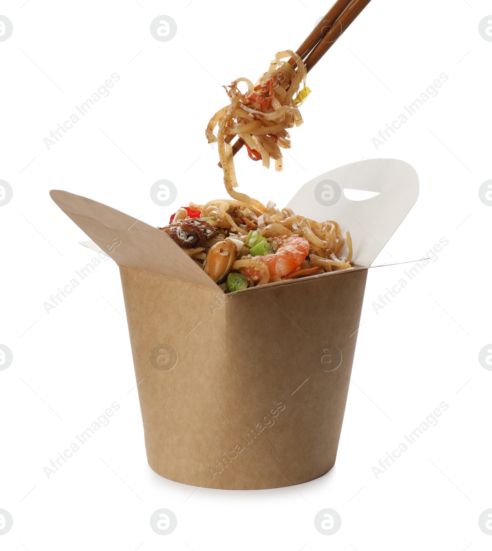 Photo of Eating seafood wok noodles with chopsticks from box isolated on white