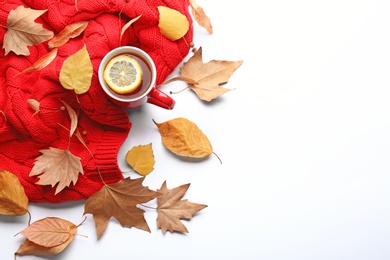 Composition with hot drink on white background, top view. Cozy autumn