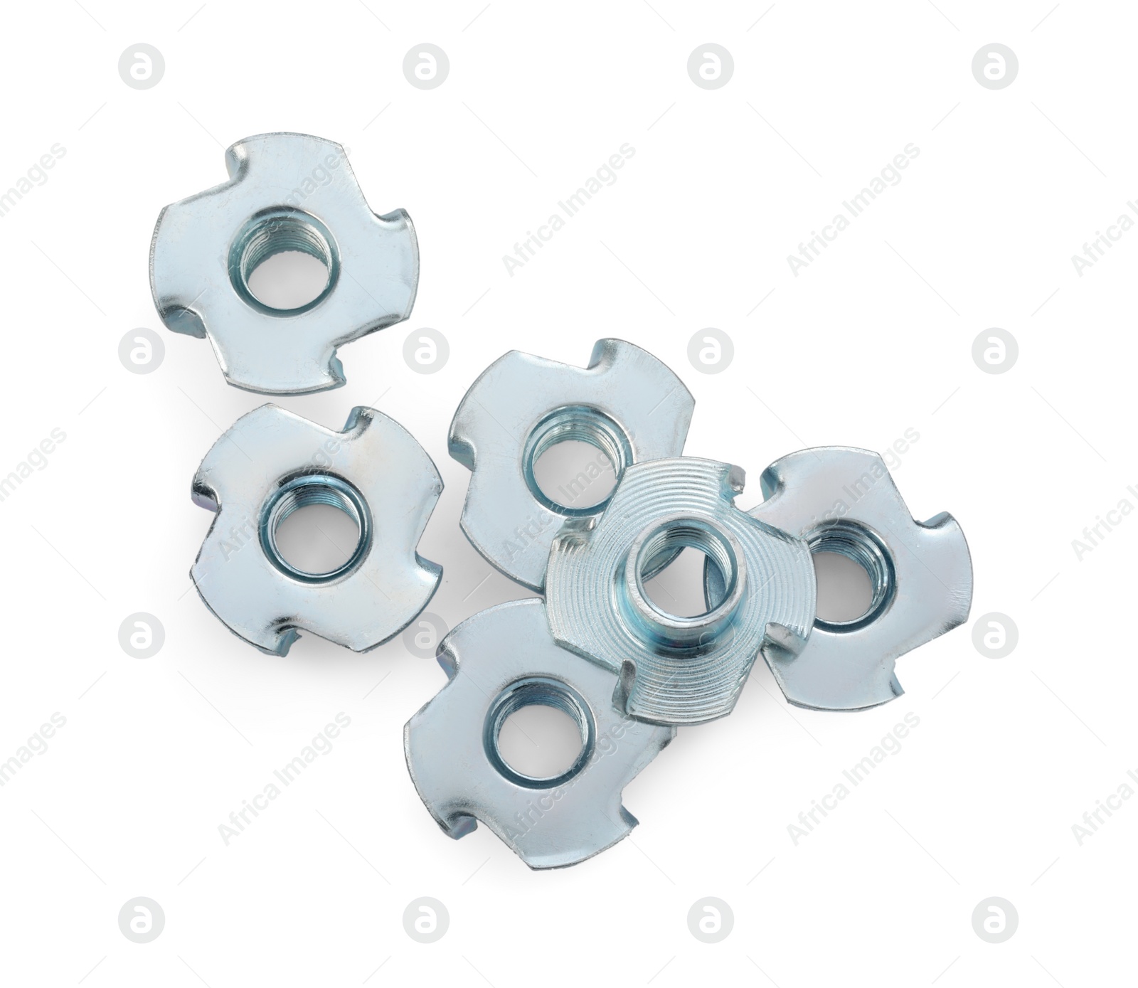 Photo of Many metal tee nuts isolated on white, top view