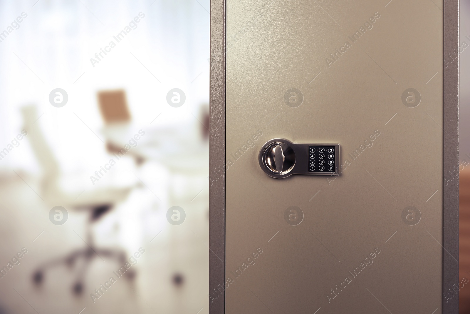 Image of Big steel safe with electronic lock indoors, closeup. Space for text