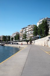 Photo of Cityscape of marina district with pier and buildings