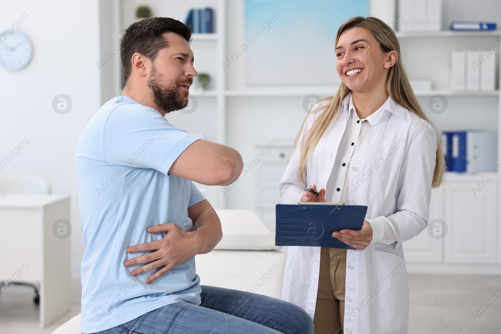 Photo of Professional doctor working with patient in hospital