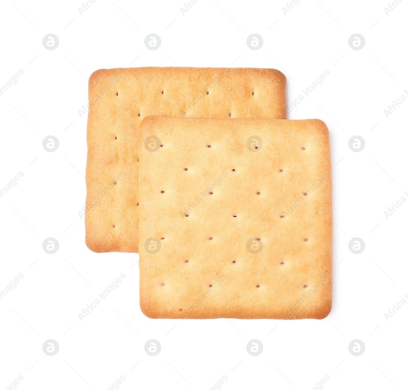 Photo of Two crispy crackers isolated on white, top view. Delicious snack