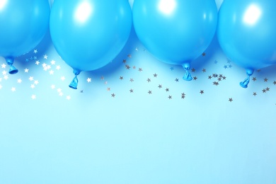 Photo of Flat lay composition with balloons and space for text on color background