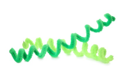 Photo of Colorful fluffy wires on white background. Party items