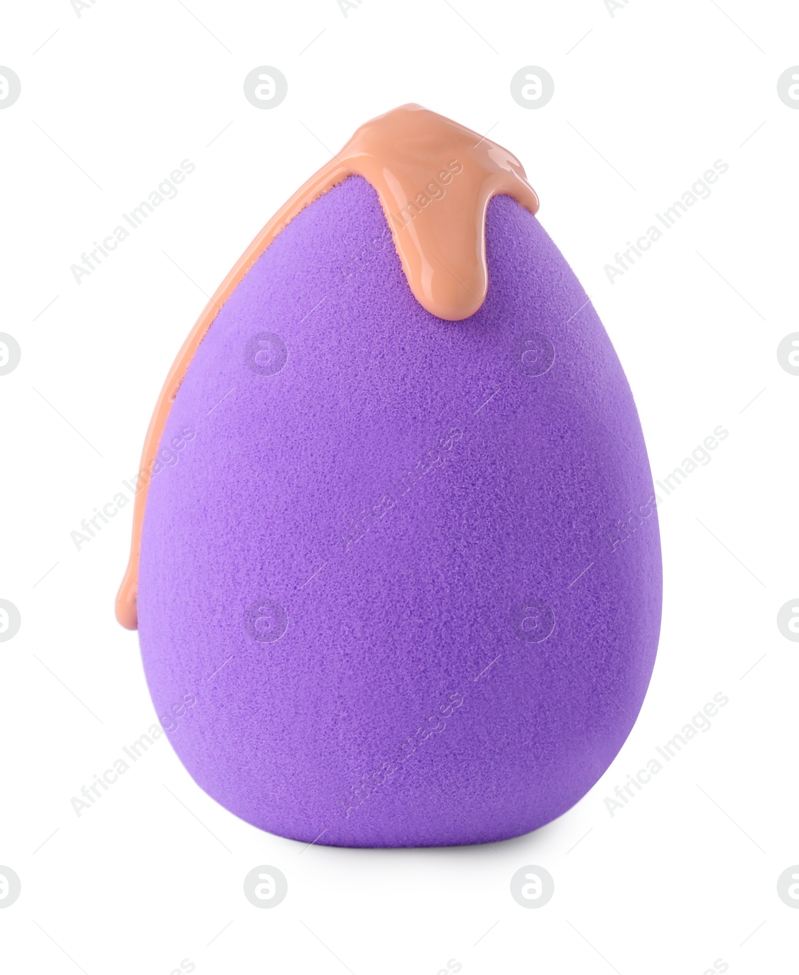 Photo of Purple makeup sponge with skin foundation isolated on white