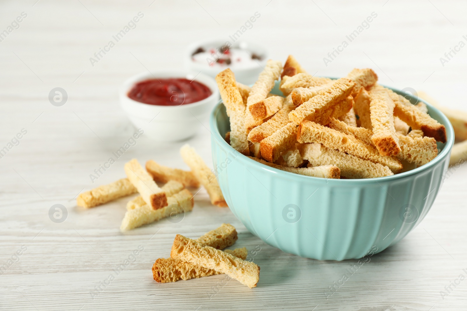 Photo of Delicious hard chucks on white wooden table