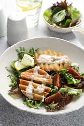 Photo of Healthy dish high in vegetable fats on light textured table, closeup