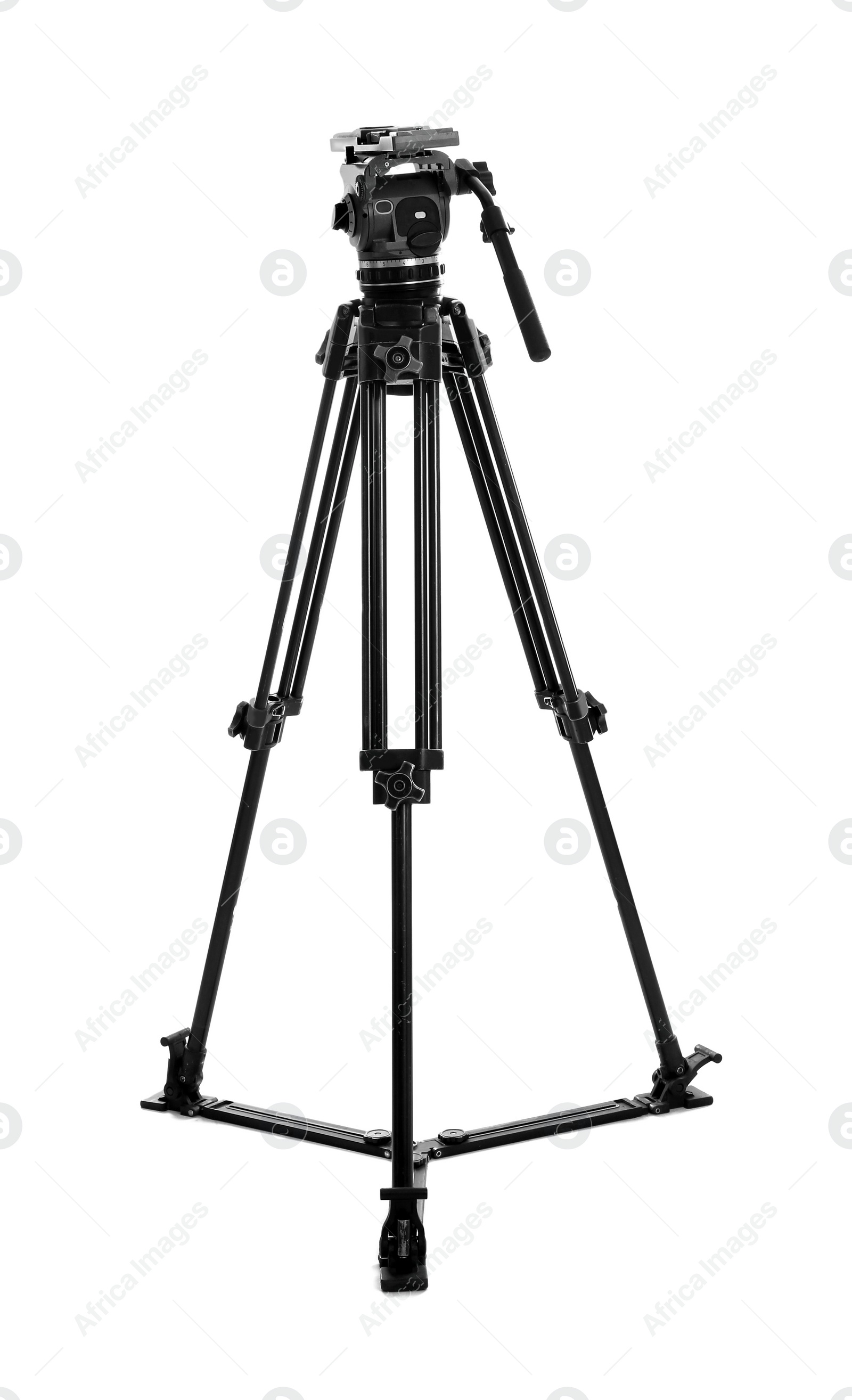 Photo of Modern tripod for video camera isolated on white