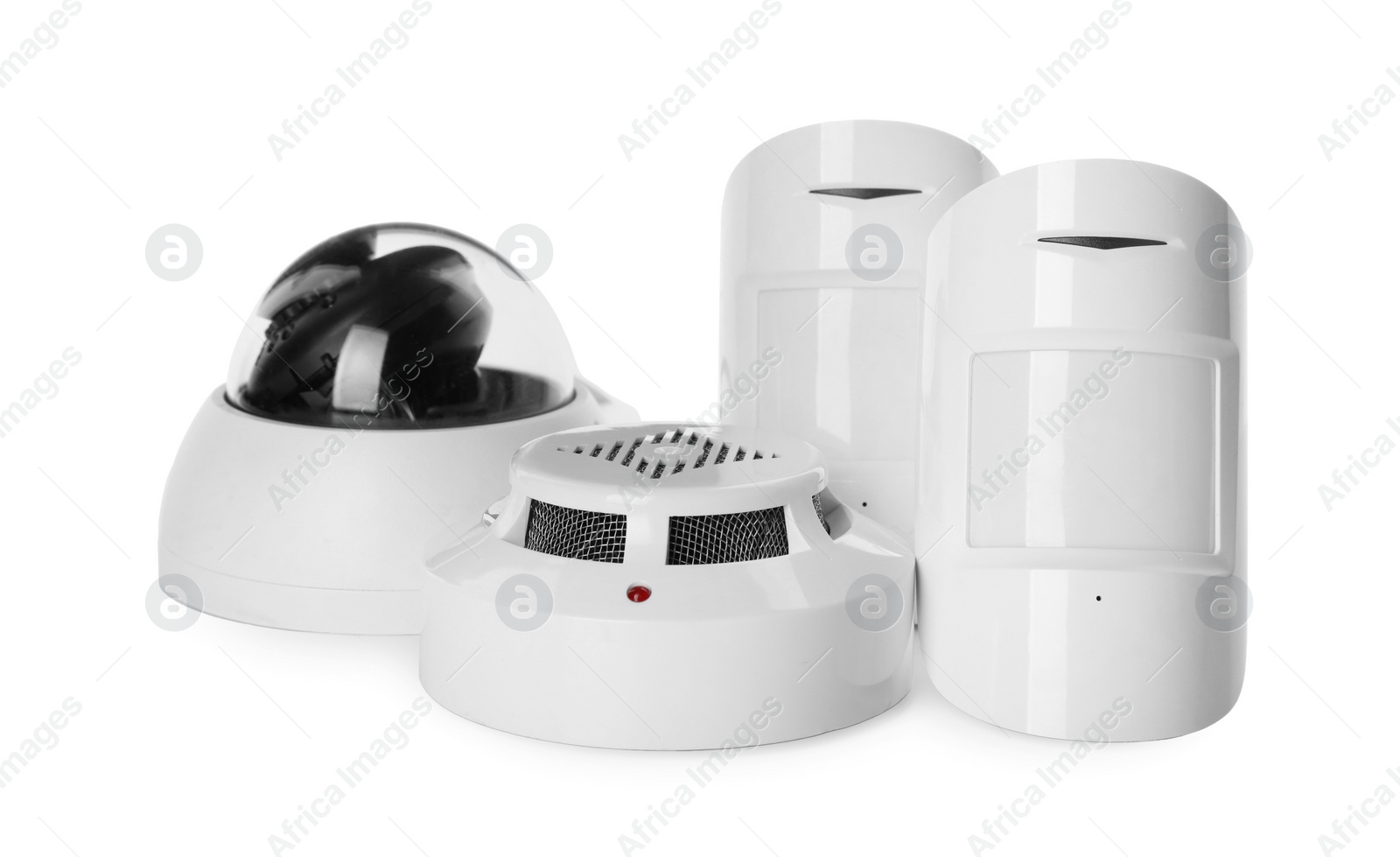 Photo of CCTV camera, smoke and movement detectors on white background. Home security system