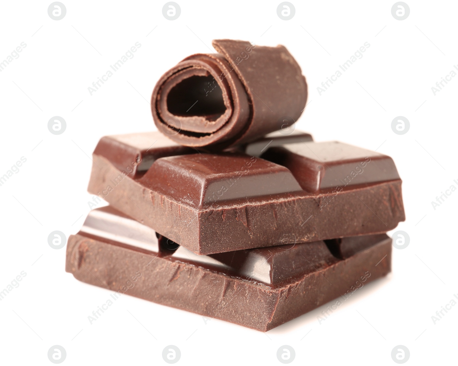 Photo of Yummy chocolate curl and pieces on white background