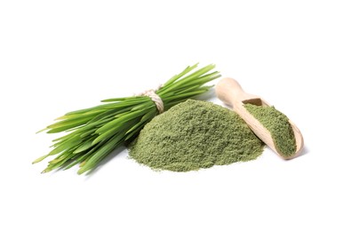 Pile of wheat grass powder, scoop and fresh sprouts isolated on white