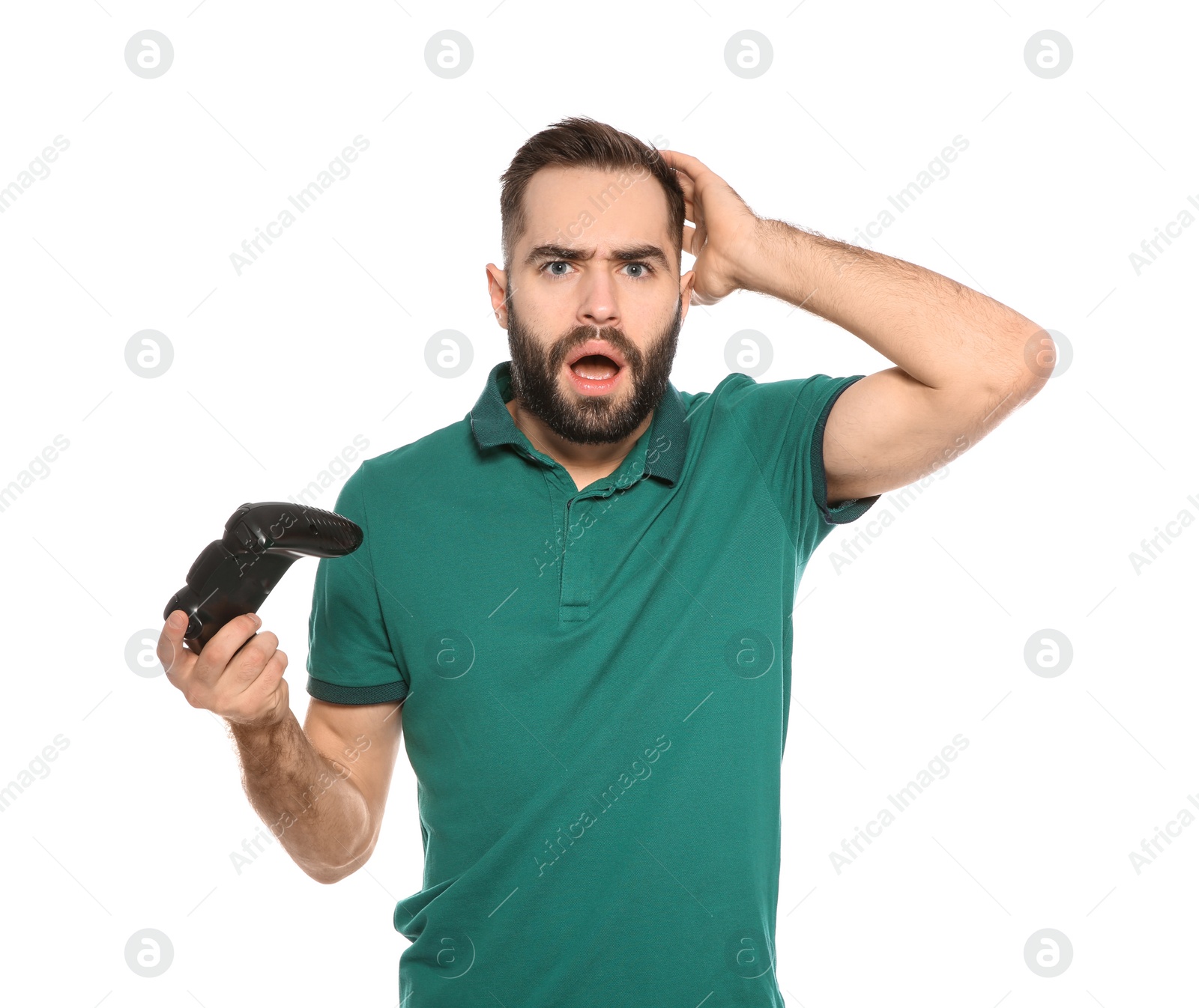 Photo of Emotional young man playing video games with controller isolated on white