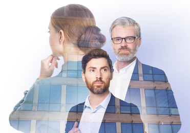 Double exposure of different businesspeople and office building
