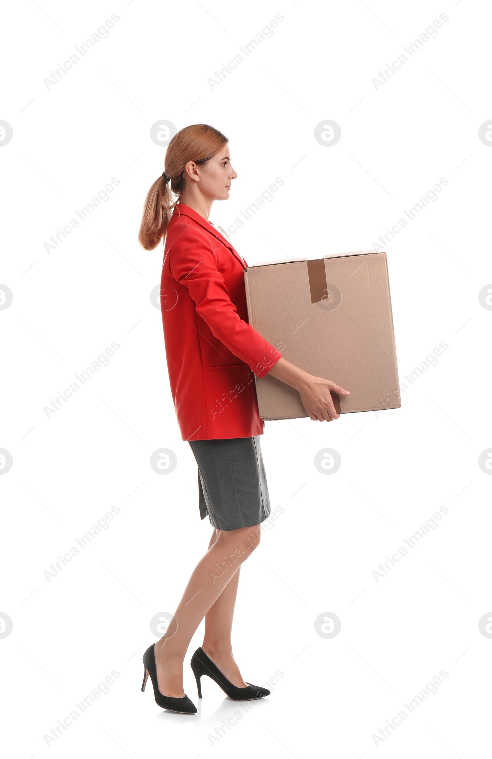 Photo of Full length portrait of woman carrying carton box on white background. Posture concept