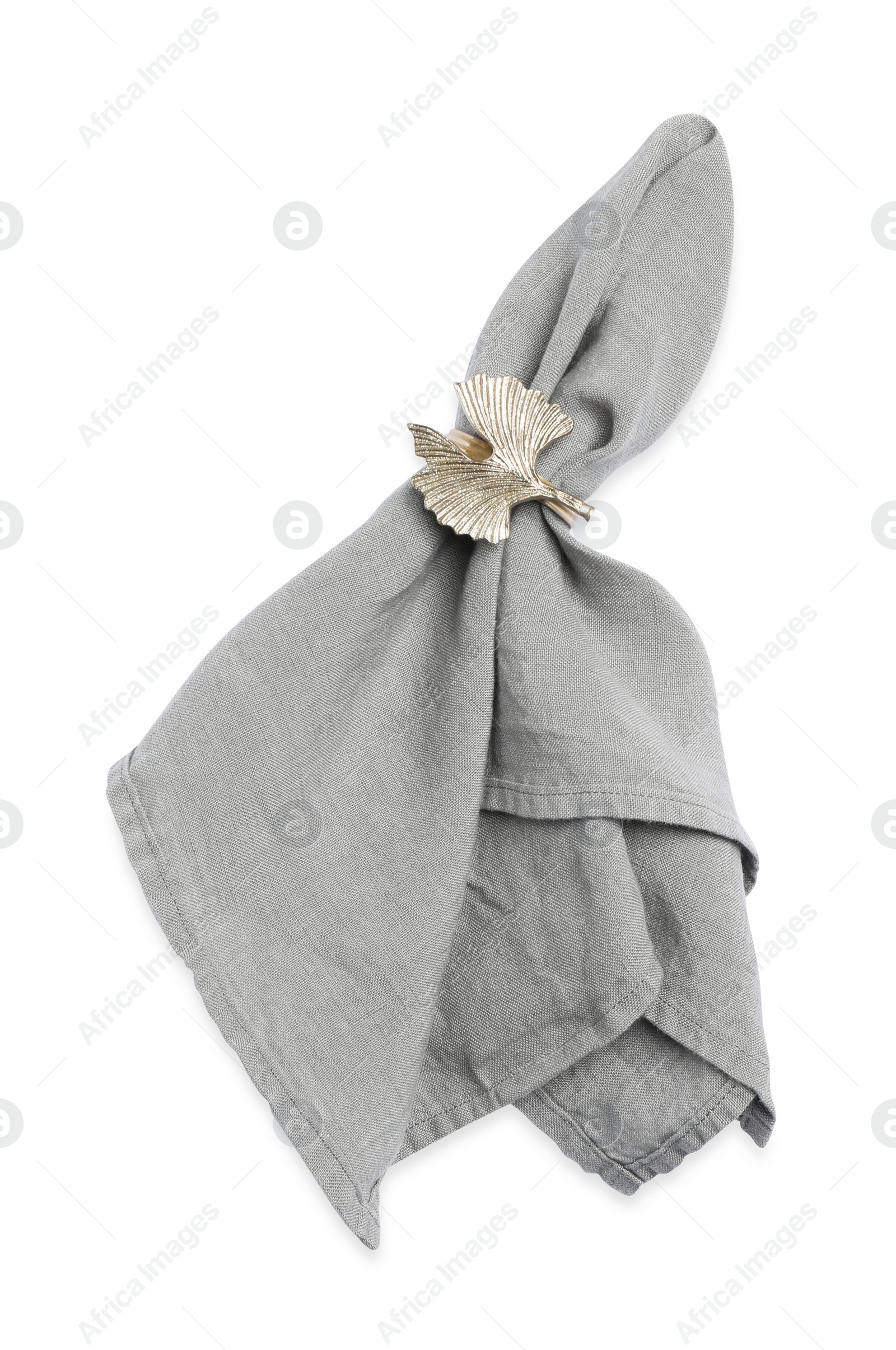 Photo of Fabric napkin with decorative ring for table setting on white background, top view