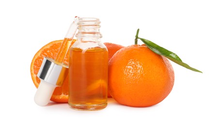 Photo of Aromatic tangerine essential oil in bottle, pipette and citrus fruits isolated on white