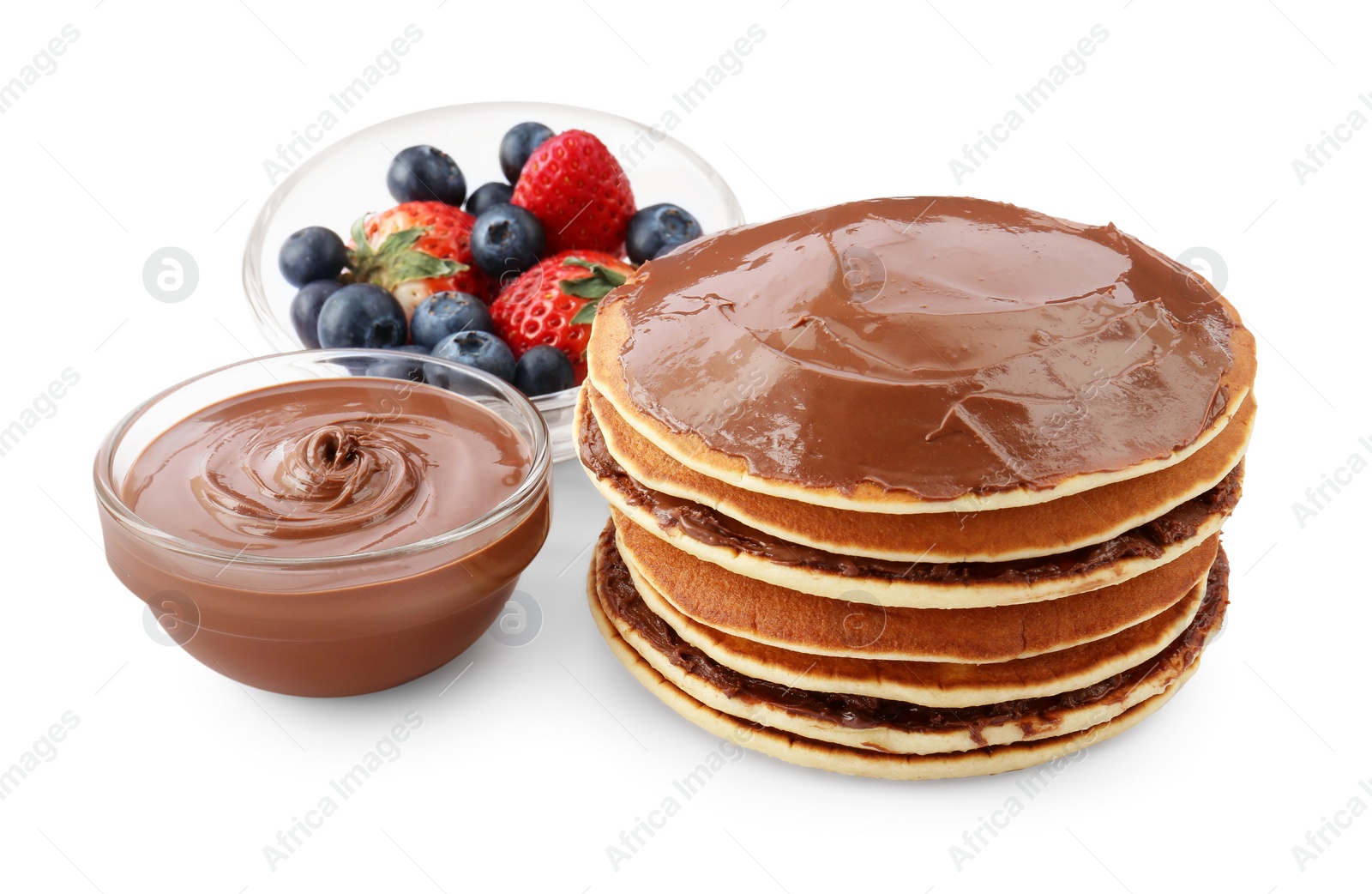 Photo of Tasty pancakes with chocolate paste and berries isolated on white