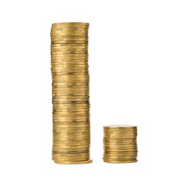 Stacks of golden coins on white background